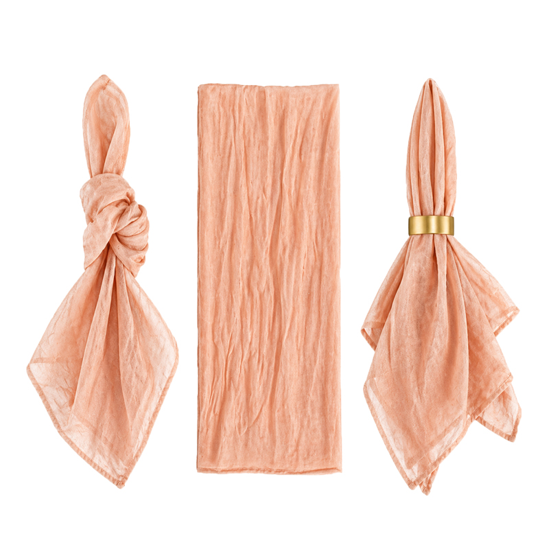 Stoffserviette aus Musselin 45x50cm in apricot peach | mieten für Hochzeit Event Catering