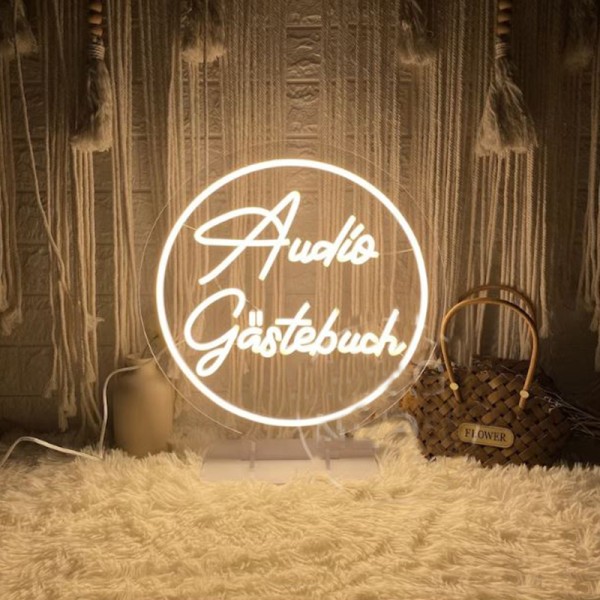Neon Schild / LED Sign "Audio Gästebuch" beleuchtet in warm weiss mieten für Hochzeit, Dekoration und Event. 